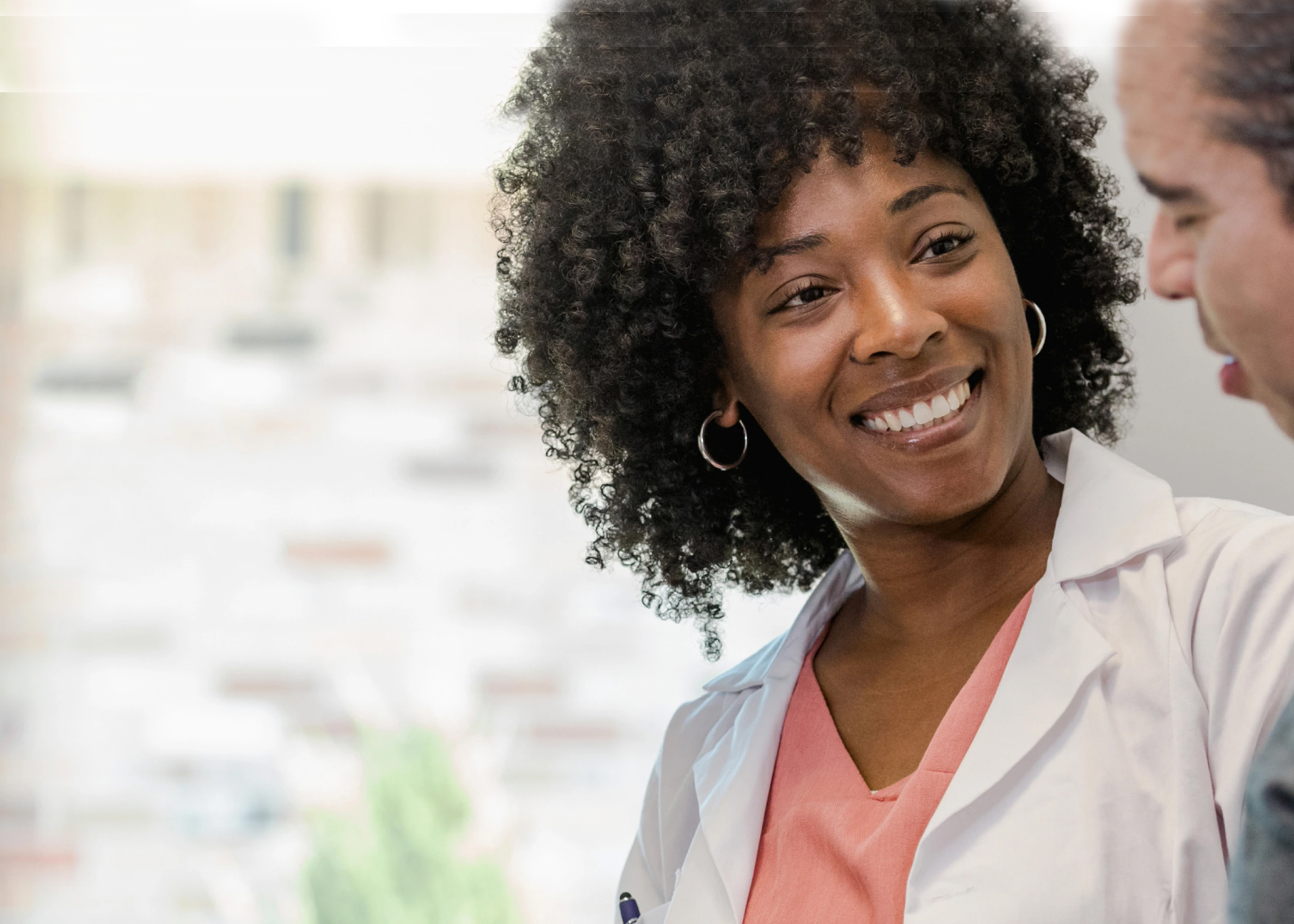 Pharmacist consulting with a patient
